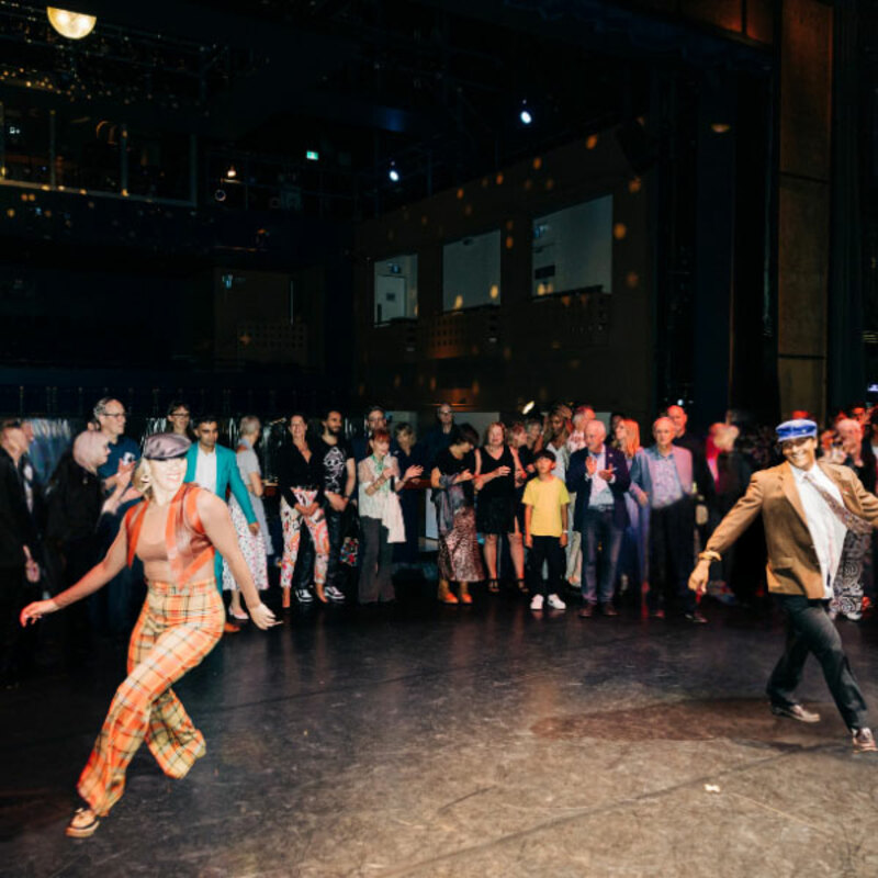 performance with crwd on stage
